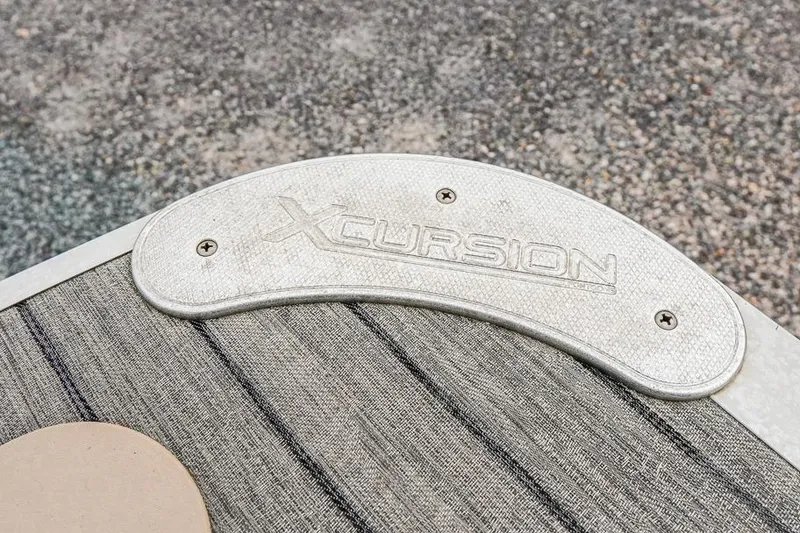 Slide: The Image of Xcursion X21C 2012 logo on textured surface, showcasing brand detail. - 37