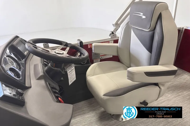 Slide: The Image of 2026 Bennington 22 SSB boat interior with steering wheel and captain's chair. - 3