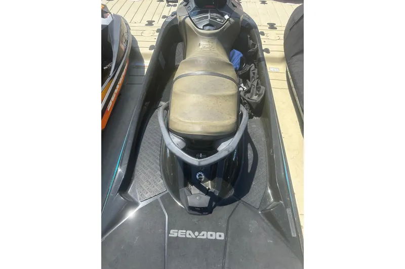 Slide: The Image of 2016 Sea-Doo GTX Limited 300 jet ski on a dock, top view. - 10