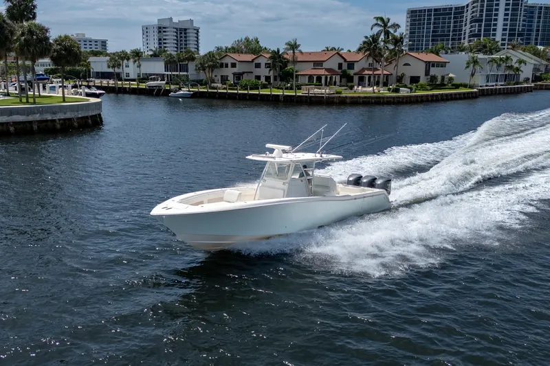 Slide: The Image of 2017 Invincible 39 Open Fisherman cruising on a scenic waterway. - 11