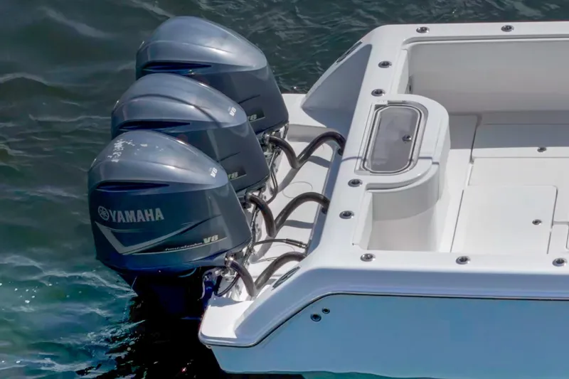 Slide: The Image of Triple Yamaha V8 engines on 2017 Invincible 39 Open Fisherman boat. - 18