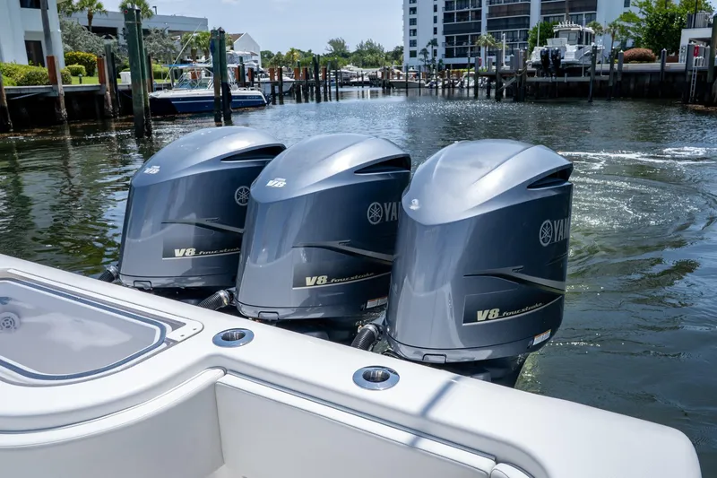 Slide: The Image of Triple Yamaha V8 engines on a 2017 Invincible 39 Open Fisherman boat. - 19