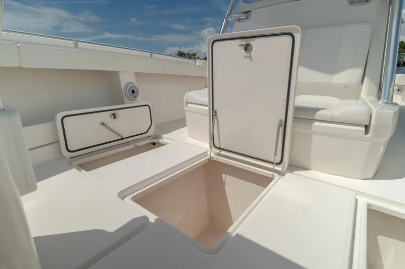 Slide: The Image of 2017 Invincible 39 Open Fisherman boat with open storage compartments. - 37
