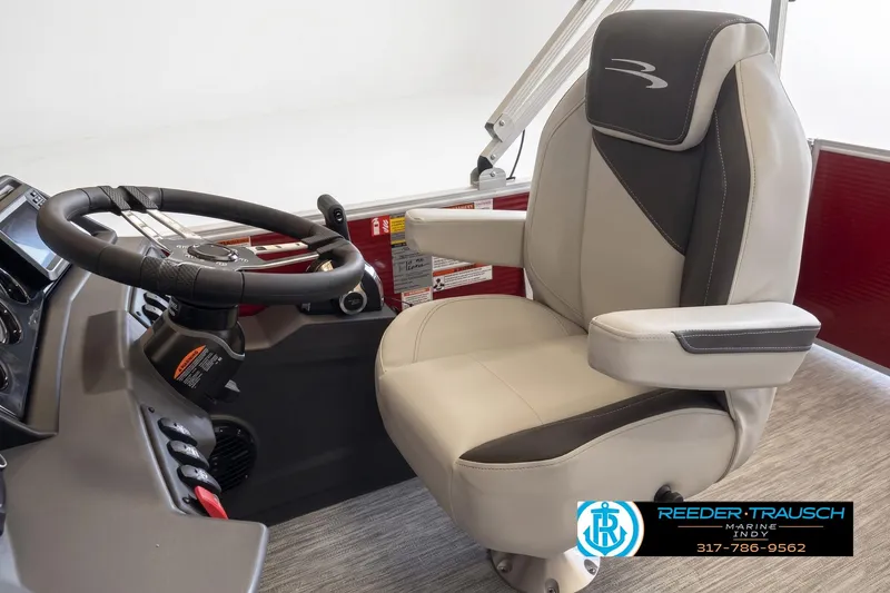 Slide: The Image of Captain's chair and steering wheel of 2026 Bennington 22 SSB pontoon boat interior. - 3