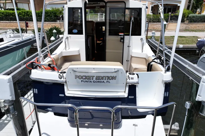 Slide: The Image of 2012 Cutwater C-26 boat docked, rear view, "Pocket Edition" from Punta Gorda, FL. - 4