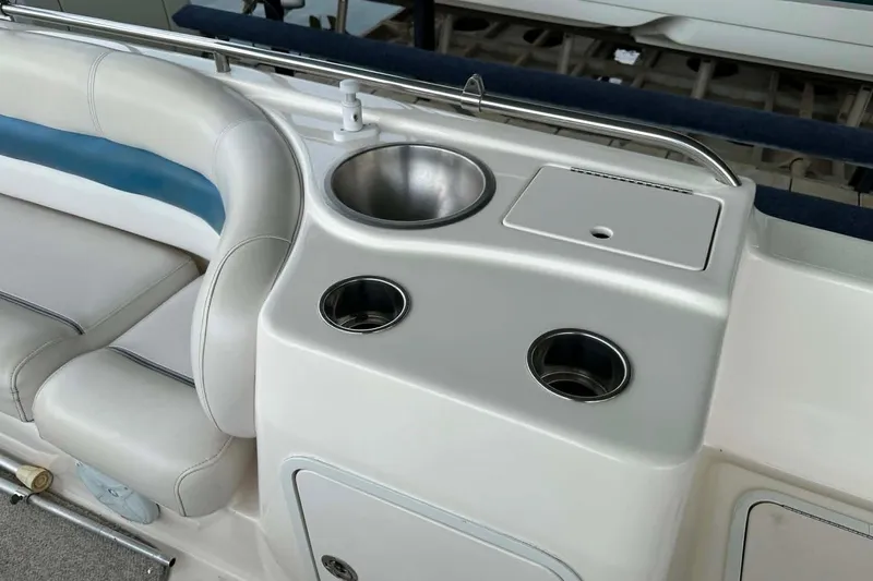Slide: The Image of 2006 Hurricane FunDeck GS 232 OB boat interior with sink and seating area. - 9