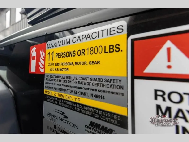 Slide: The Image of Boat capacity label for 11 persons or 1800 pounds. - 25