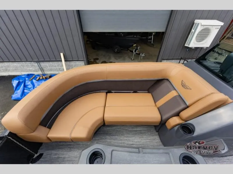 Slide: The Image of Luxurious brown leather seating on a 2026 M Series 23 MSB boat. - 29