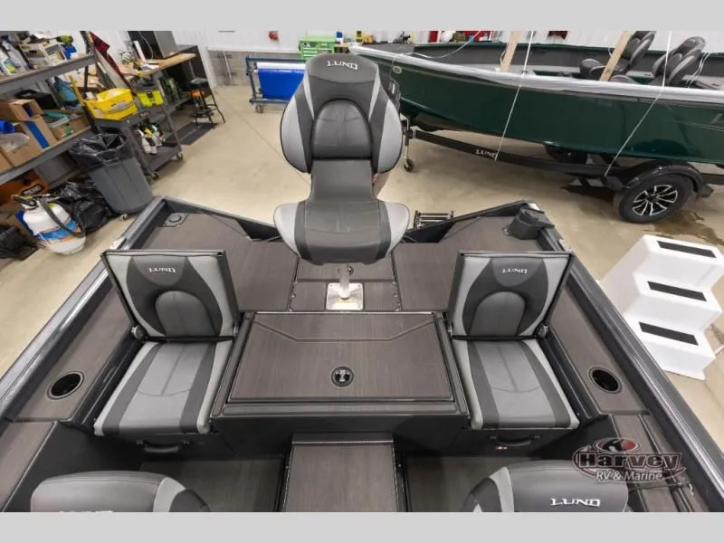 Slide: The Image of Interior view of a 2026 Renegade 1875 SS boat with gray seats. - 11