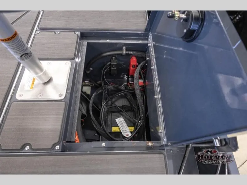 Slide: The Image of Renegade 1875 SS 2026 boat battery compartment with cables and connections. - 12