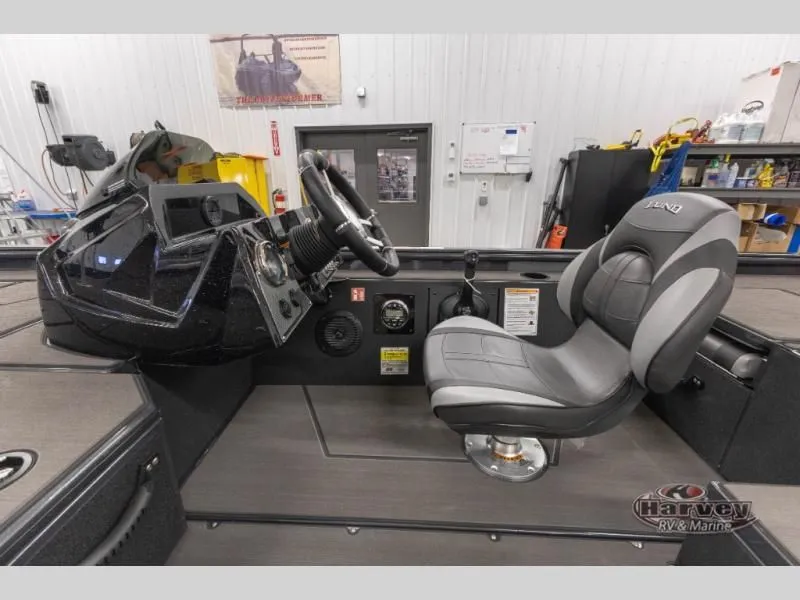Slide: The Image of Interior of 2026 Renegade 1875 SS with steering console and seat. - 21