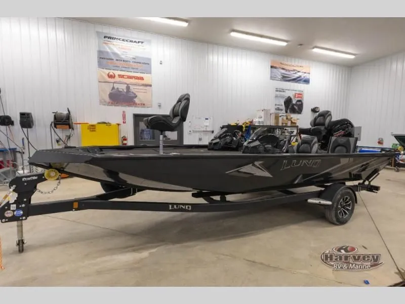 Slide: The Image of 2026 Renegade 1875 SS boat displayed in a workshop. - 8