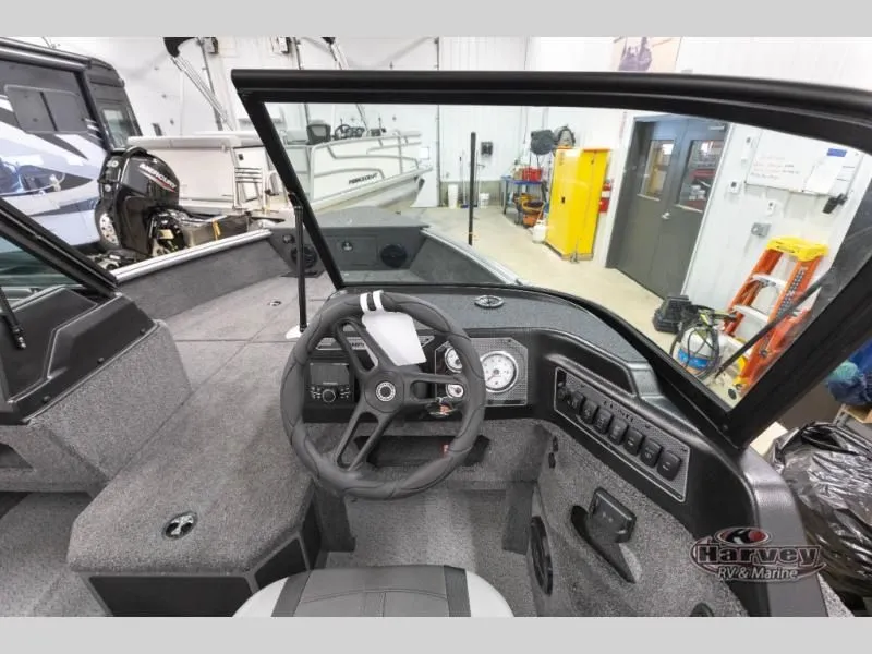 Slide: The Image of Interior view of 2026 Impact XS 1775 Sport boat in showroom. - 24