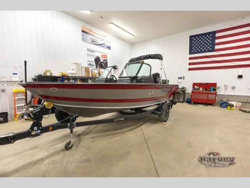 Slide: The Image of 2026 Impact XS 1775 Sport boat in workshop with US flag. - 4