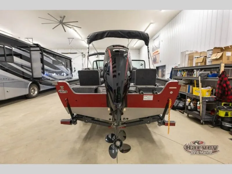 Slide: The Image of Rear view of a 2026 Impact XS 1775 Sport boat in a workshop. - 6