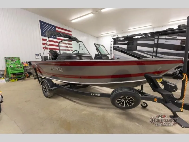 Slide: The Image of 2026 Impact XS 1775 Sport boat in a workshop with American flag. - 8