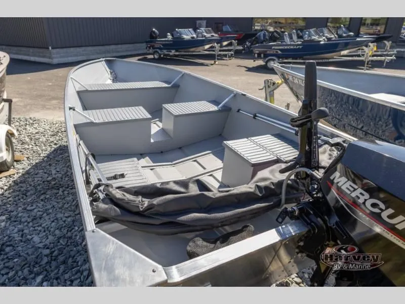 Slide: The Image of Starfish 16 LWT boat 2023 with Mercury engine on gravel lot. - 6