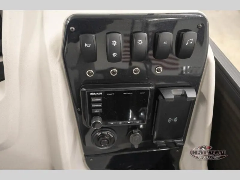 Slide: The Image of Control panel of Vectra Classic 21 RL 2026 with switches and radio. - 22