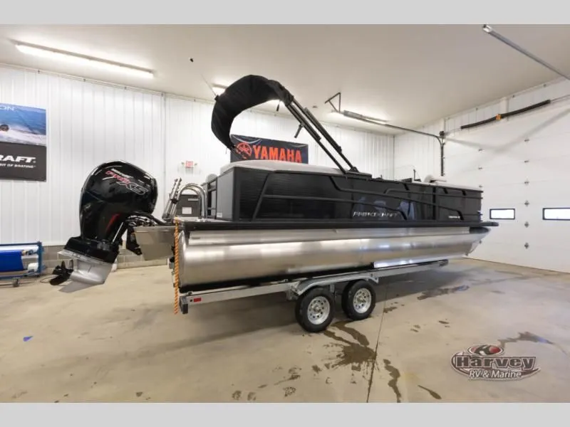 Slide: The Image of 2026 Vectra Classic 23 QL pontoon boat in a garage. - 7