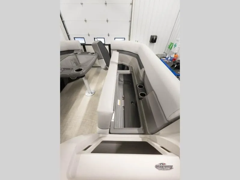 Slide: The Image of Interior of Vectra Speed 21L boat, 2026 model, featuring seating and table. - 23