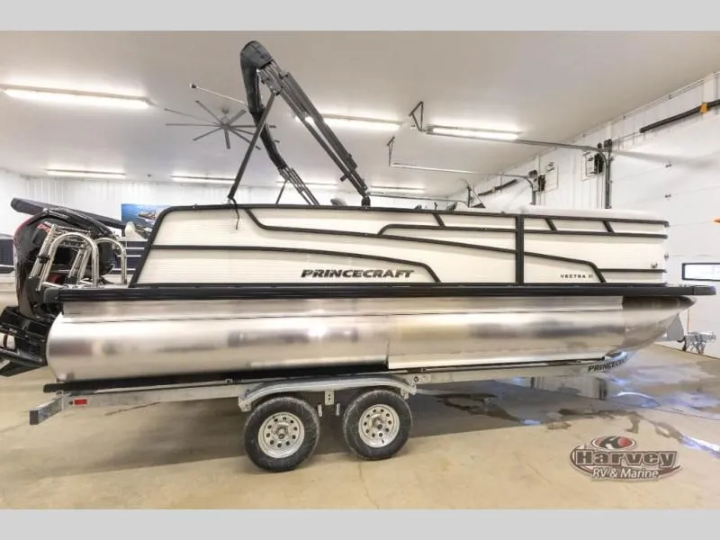 Slide: The Image of 2026 Vectra Speed 21L pontoon boat in a garage. - 4