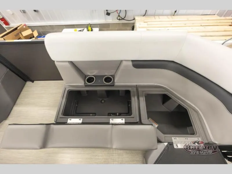 Slide: The Image of Interior of 2026 Sportfisher Sport 23-2RS with storage and cup holders. - 12
