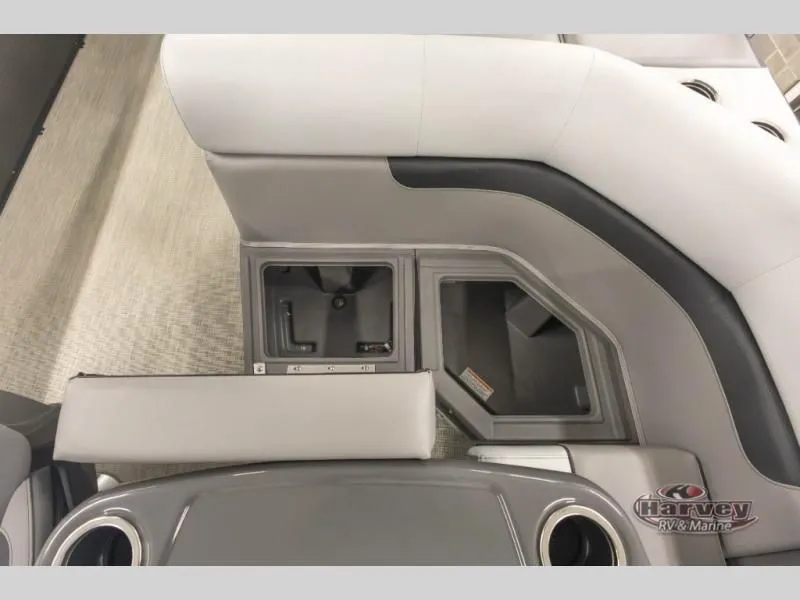 Slide: The Image of Interior of 2026 Sportfisher Sport 23-2RS with storage and cup holders. - 15