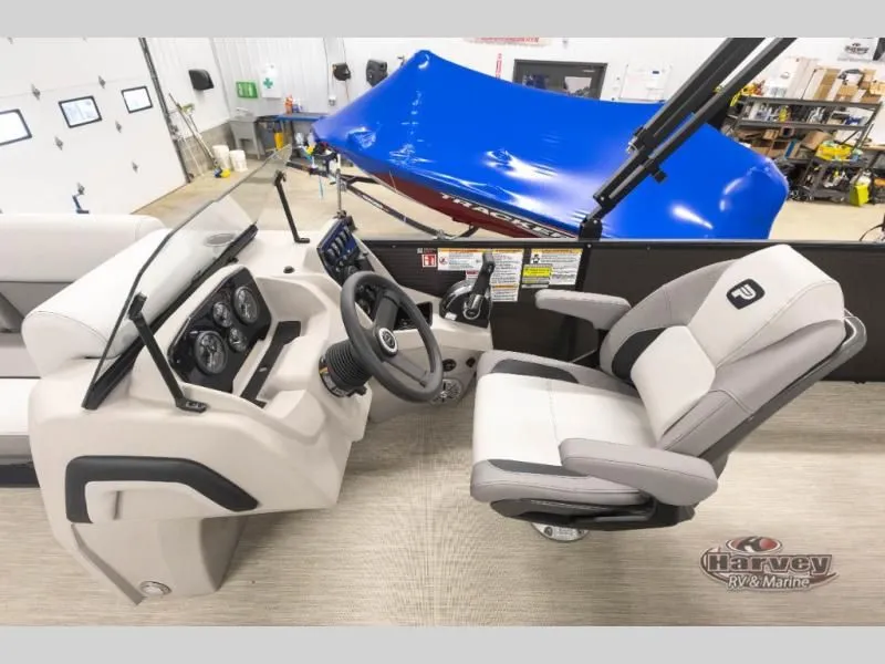 Slide: The Image of Interior of 2026 Sportfisher Sport 23-2RS with helm console and seat. - 23
