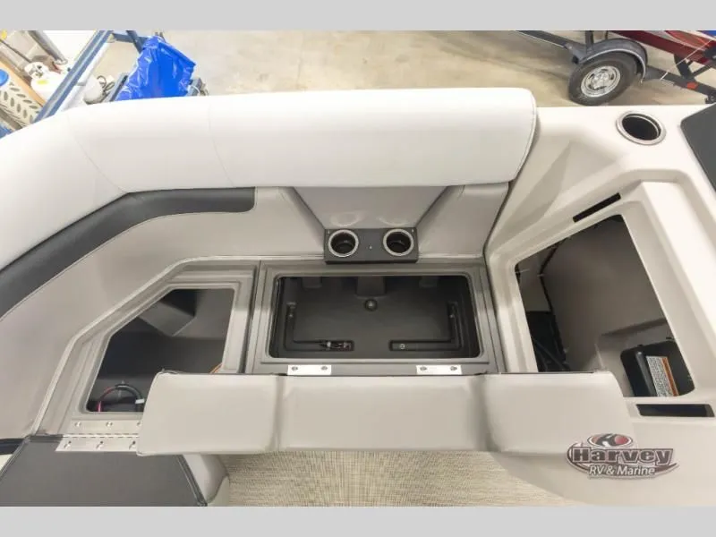 Slide: The Image of Interior of 2026 Sportfisher Sport 23-2RS with storage and cup holders. - 29