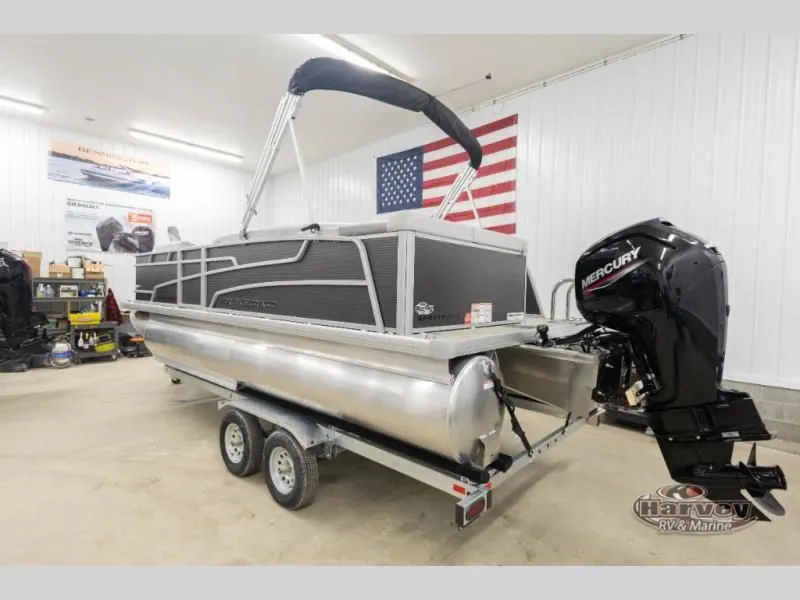 Slide: The Image of 2026 Sportfisher Speed 21-2S boat in a workshop with US flag. - 4