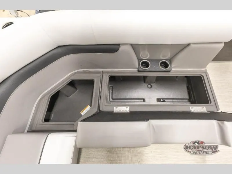 Slide: The Image of Interior of 2026 Vectra Classic 19 L with storage and cup holders. - 14