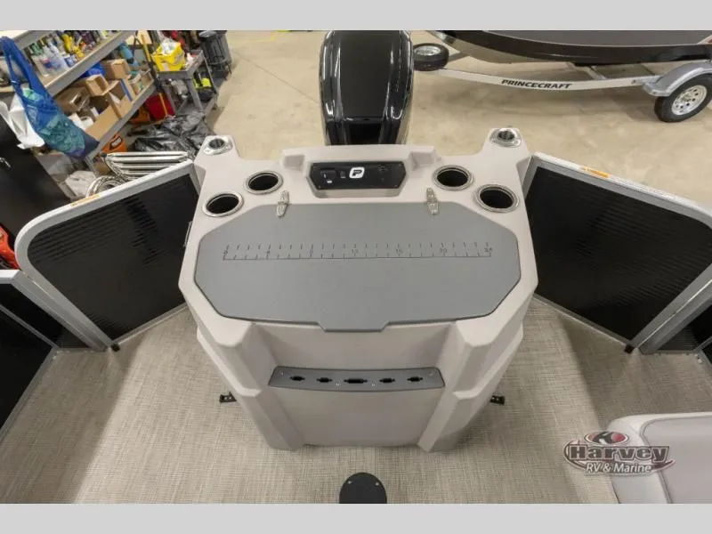 Slide: The Image of Sportfisher Speed 21-2RS 2026 boat console with cup holders and storage. - 10