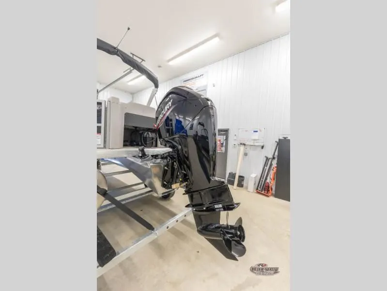 Slide: The Image of Sportfisher Speed 21-2RS 2026 with Mercury outboard motor in workshop. - 5