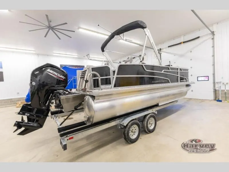 Slide: The Image of 2026 Sportfisher Speed 21-2RS pontoon boat on trailer in garage. - 6