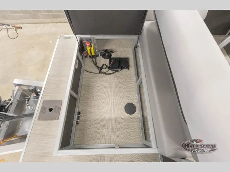 Slide: The Image of Interior view of Vectra Classic 21 RL 2026 with storage compartment. - 12