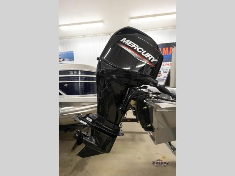 Slide: The Image of Mercury outboard motor on a 2026 Sportfisher Classic 21-2RS boat. - 6