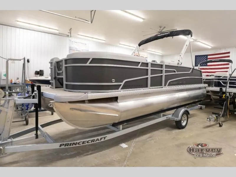 Slide: The Image of 2026 Sportfisher Classic 21-2RS pontoon boat on trailer in workshop. - 7