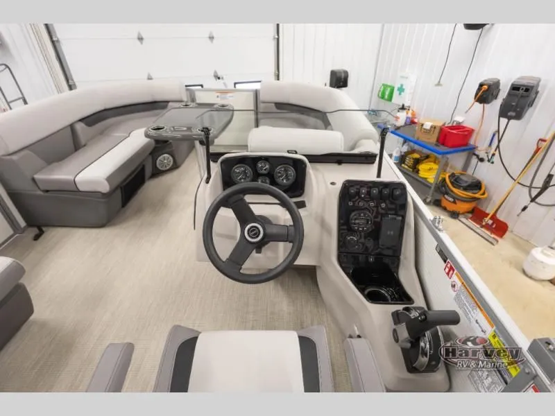 Slide: The Image of Interior of a 2026 Vectra Classic 19 L boat with helm console. - 19