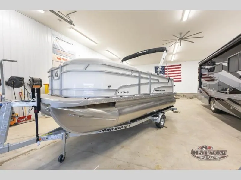 Slide: The Image of 2026 Vectra Classic 19 L pontoon boat in a garage. - 4