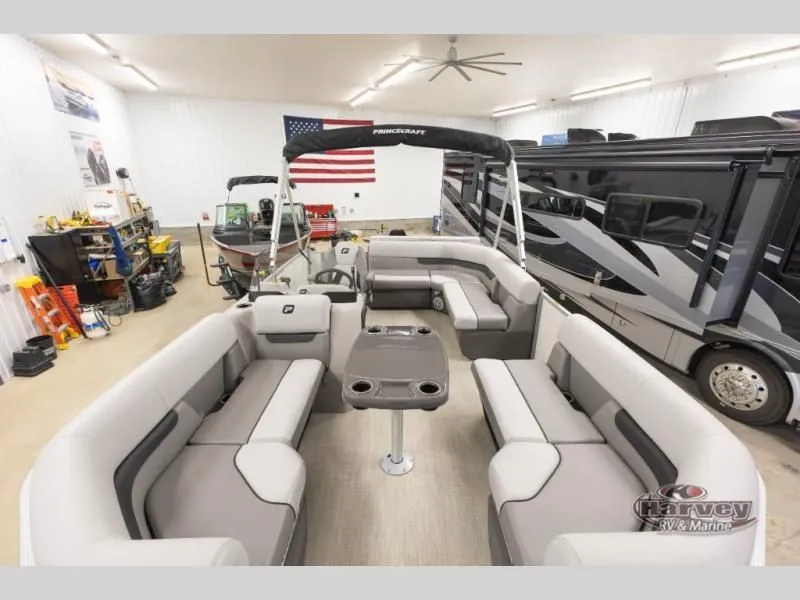 Slide: The Image of Interior view of a 2026 Vectra Classic 19 L pontoon boat in a workshop. - 9
