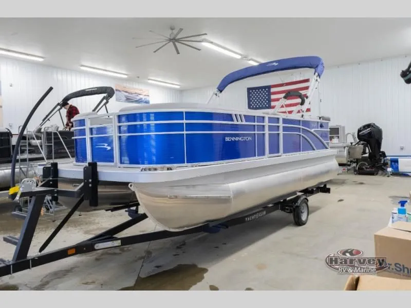 Slide: The Image of Bennington pontoon boat SX Series 20 SXLG 2026 in a workshop. - 5