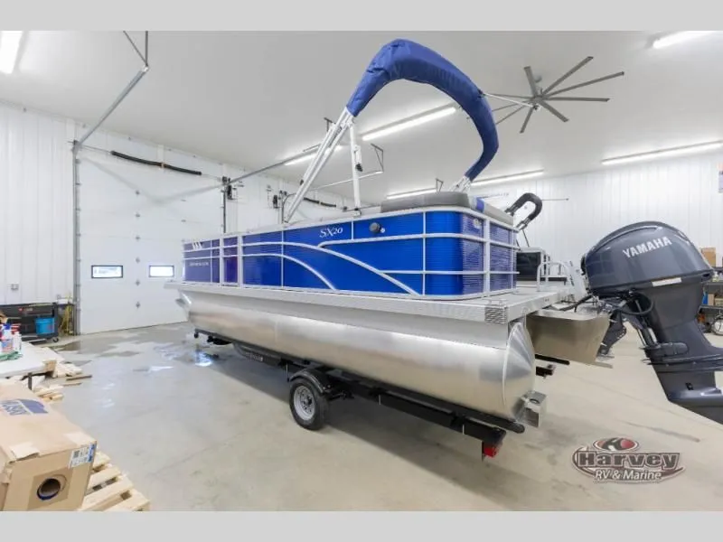 Slide: The Image of 2026 SX Series 20 SXLG pontoon boat in a workshop. - 7