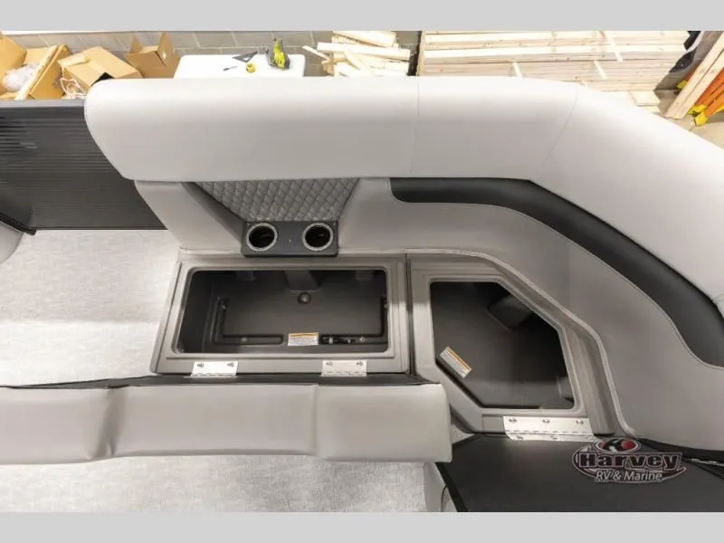 Slide: The Image of Interior of Vectra Classic 21 QL 2026 with storage and cup holders. - 12