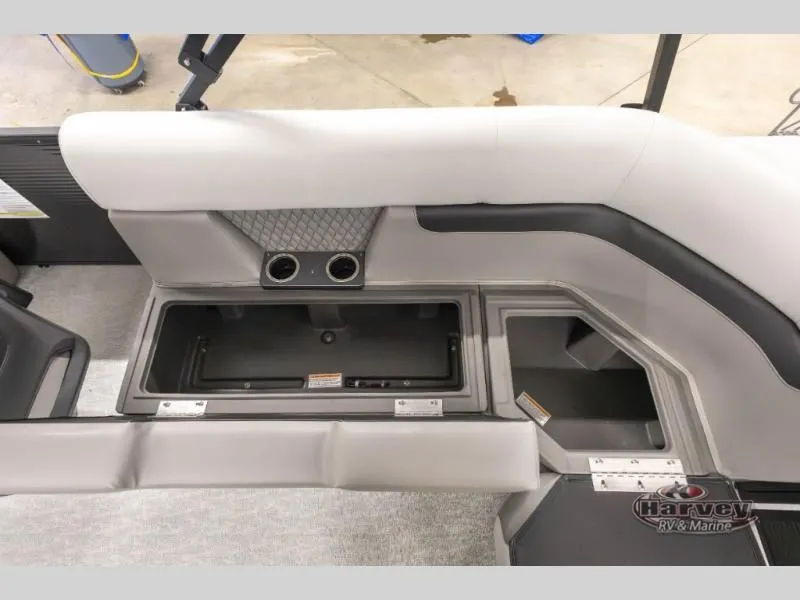 Slide: The Image of Interior of Vectra Classic 21 QL 2026 with storage and cup holders. - 17