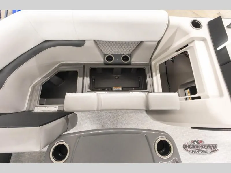 Slide: The Image of Interior of 2026 Vectra Classic 21 QL with storage and cup holders. - 25