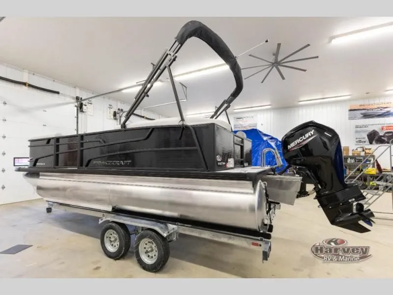 Slide: The Image of 2026 Vectra Classic 21 QL pontoon boat in a workshop. - 7