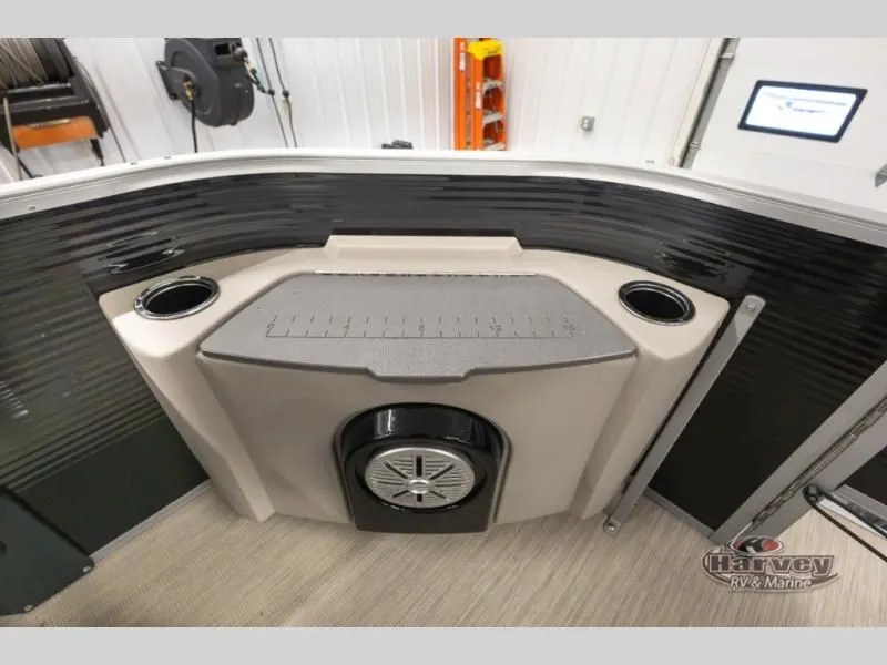 Slide: The Image of Interior of Sportfisher Classic 21-2S 2026 with speaker and cup holders. - 11
