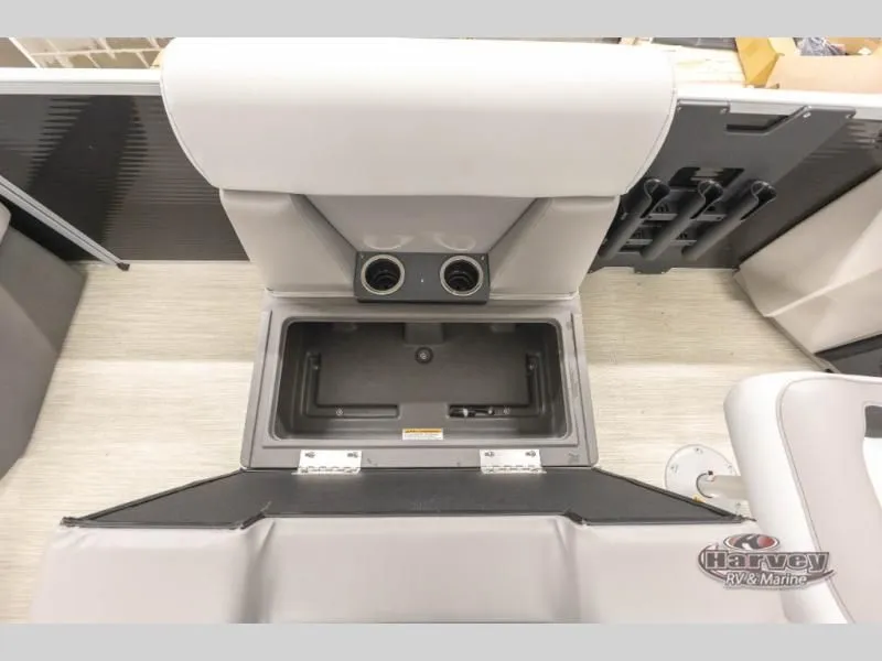 Slide: The Image of Interior of Sportfisher Classic 21-2S 2026 with storage and cup holders. - 14