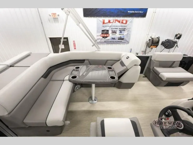 Slide: The Image of Interior of Sportfisher Classic 21-2S 2026 with gray seating and table. - 15