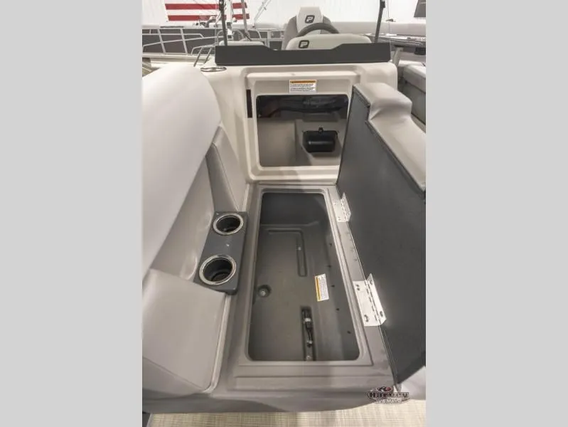 Slide: The Image of Interior of 2026 Sportfisher Classic 21-2S with storage and cup holders. - 25